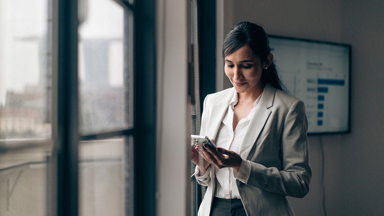 woman texting on her phone